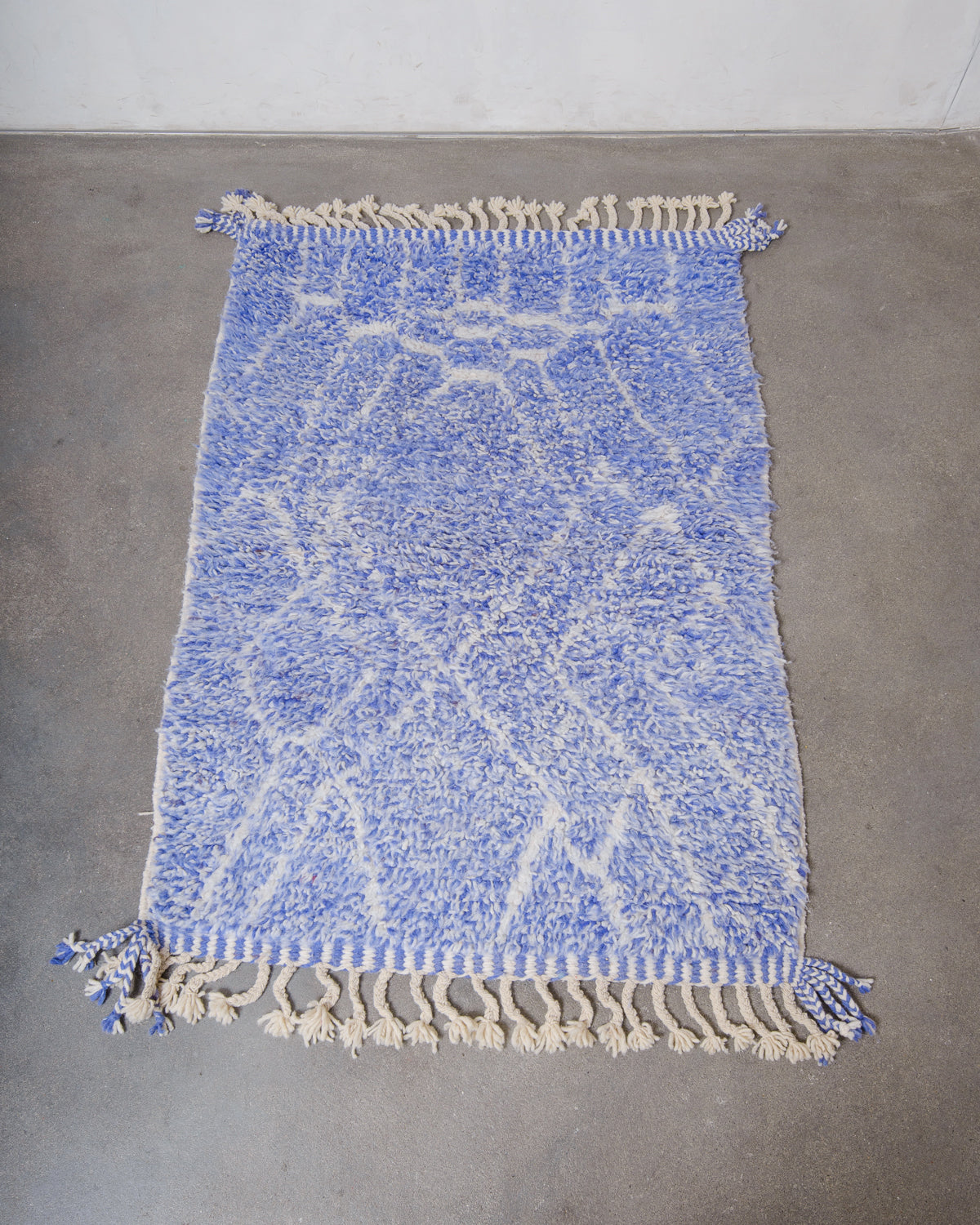 Modern, designer, handcrafted Berber rug from Morocco. Beniourain carpet with beautiful colours and patterns and fluffy wool texture.